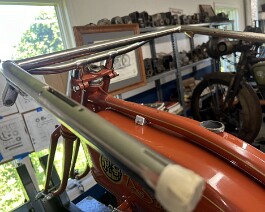The original handlebars in place after all the pitting was removed and several coats of copper and nickel plating was completed.